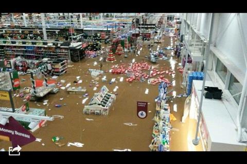 Flooding forced customers to be evacuated from this Sainsbury's store in Cumbria.